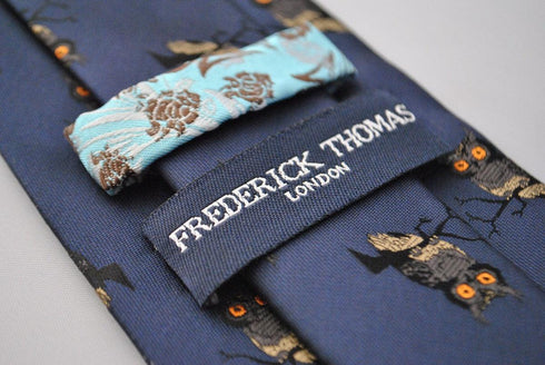 navy tie with owl design