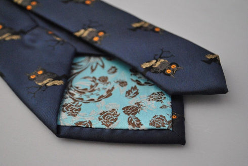 navy tie with owl design