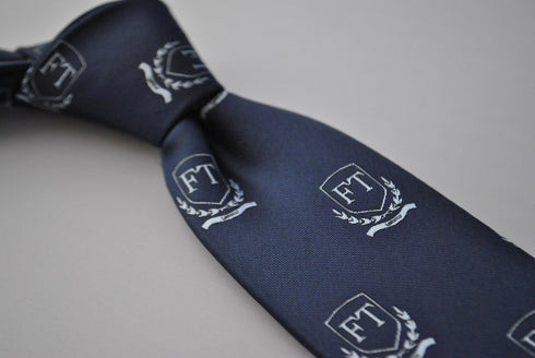 navy tie with Frederick Thomas crest