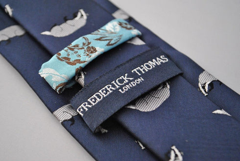 navy tie with badger design