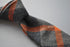 orange and grey wool check style skinny tie