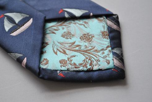 navy tie with sailing boat embroidered design