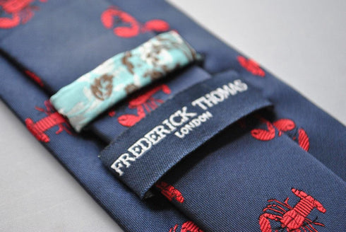 navy tie with lobster embroidered design