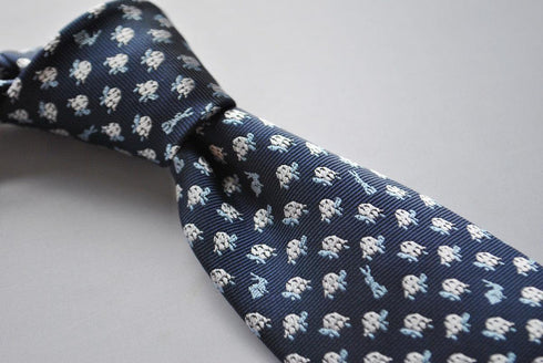 navy tie with hare and tortoise embroidered design