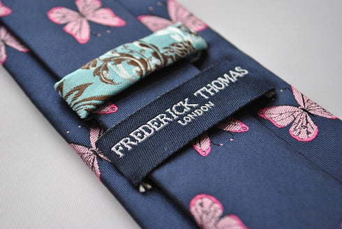 navy tie with pink butterfly embroidered design