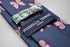 navy tie with pink butterfly embroidered design