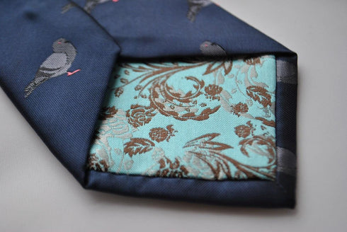 navy tie with grey pigeon embroidered design