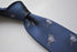 navy tie with grey pigeon embroidered design