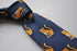navy tie with ginger cat embroidered design