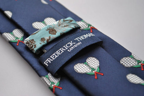 navy tie with tennis racket embroidered design