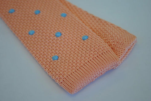 pale pink skinny knitted tie with light blue polka dots