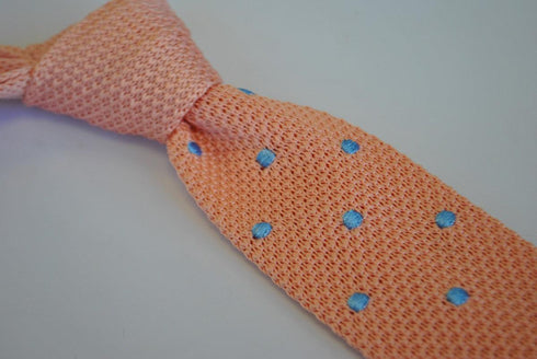 pale pink skinny knitted tie with light blue polka dots