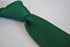 plain dark green skinny knitted tie with pointed end