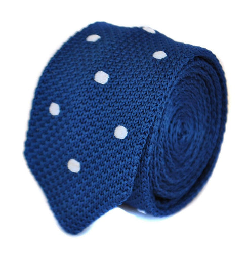 navy blue skinny knitted tie with white polka dots and pointed end