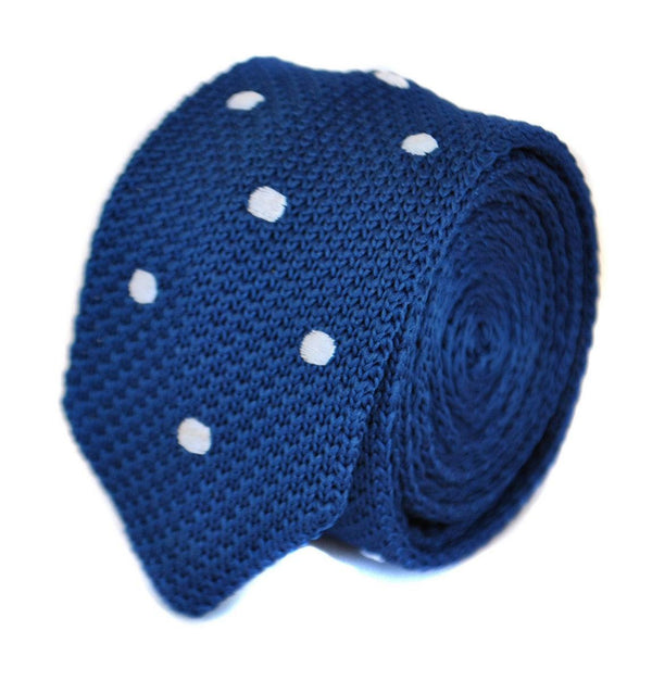 navy blue skinny knitted tie with white polka dots and pointed end