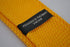skinny plain gold yellow knitted tie with pointed end