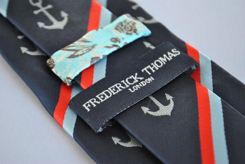 navy tie with striped anchor design