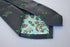 navy tie with green turtle design