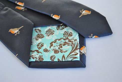 navy tie with embroidered robin design