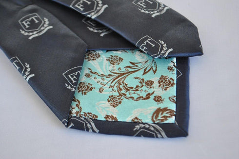 navy tie with Frederick Thomas crest design