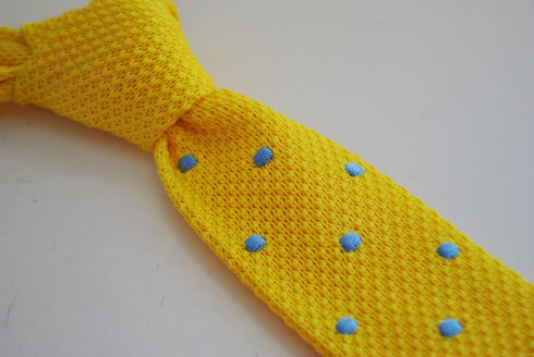 yellow skinny knitted tie with light blue polka dots