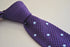 skinny knitted cadbury purple tie with light blue polka dots