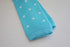 turquoise blue skinny knitted tie with white polka dots