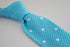 turquoise blue skinny knitted tie with white polka dots