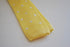 yellow lemon skinny knitted tie with white polka dots