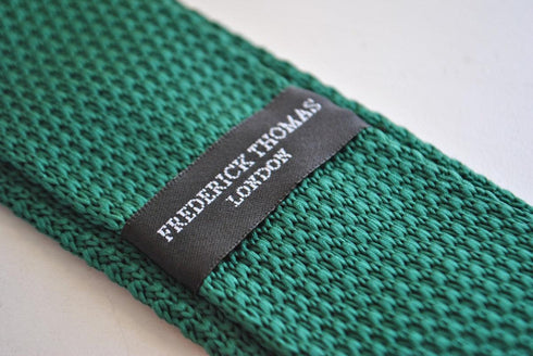 dark green skinny knitted tie with red polka dots