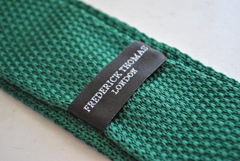 emerald green skinny knitted tie with white polka dots