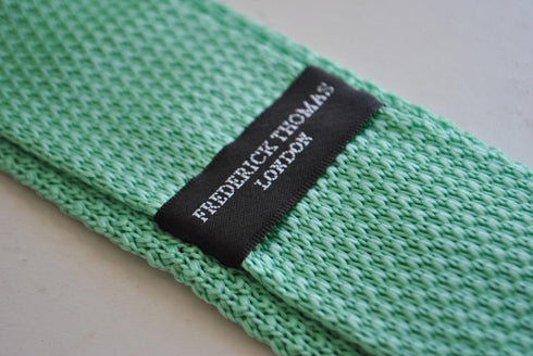 mint green skinny knitted tie with white polka dots