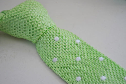 lime green skinny knitted tie with white polka dots
