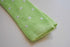 lime green skinny knitted tie with white polka dots