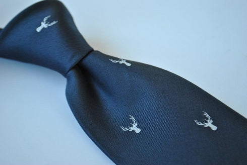 navy blue tie with white deer head design