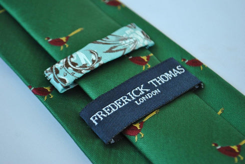 dark green tie with pheasant design