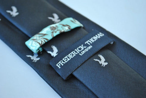 navy blue tie with eagle design