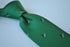 dark green tie with flying duck design