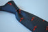 navy blue tie with F1 racing car design