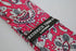 skinny cotton tie with bright pink floral and paisley design