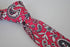 skinny cotton tie with bright pink floral and paisley design