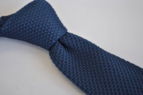 plain navy blue skinny knitted tie with pointed end