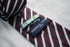 purple and white double stripe striped tie