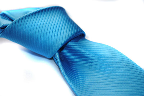 bright turquoise plain tie with a very subtle stripe