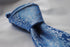 blue tie with floral design