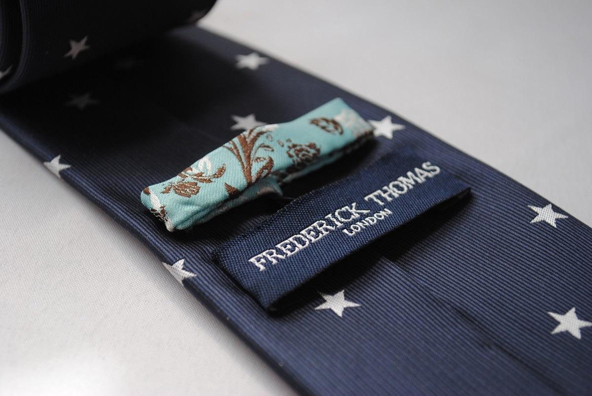 handmade slim navy tie with white stars and signature floral design to ...